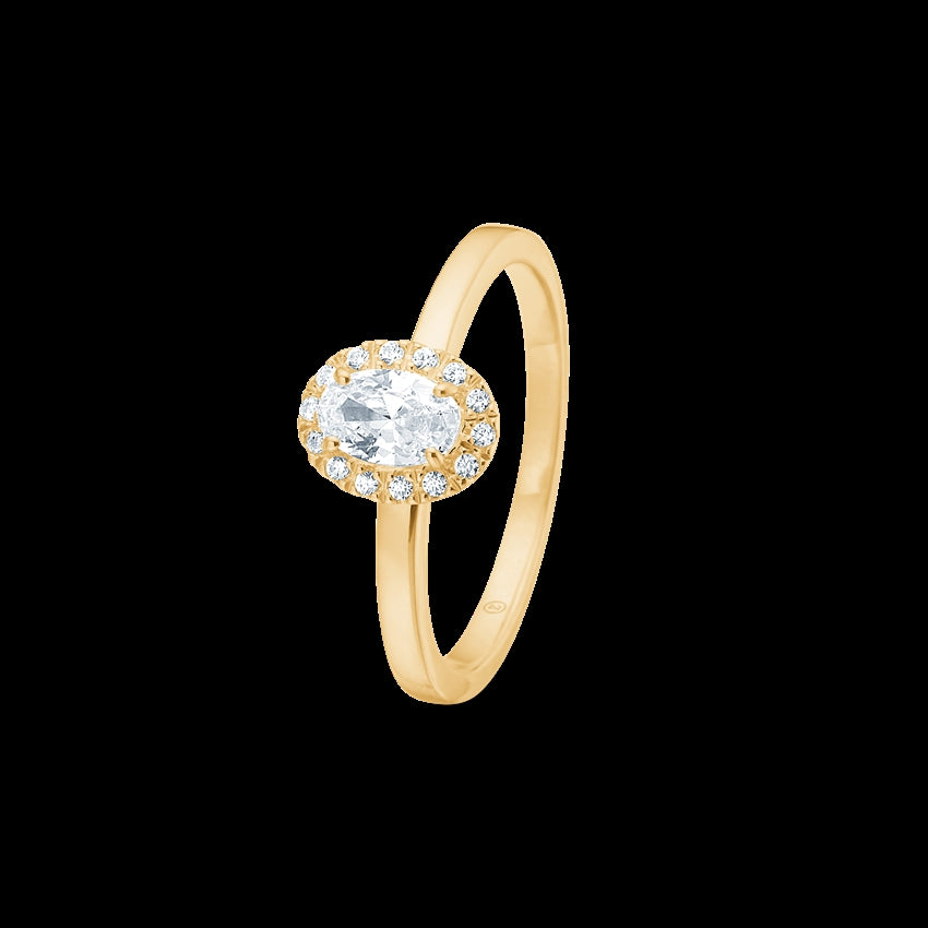 Stellar ring i 8 karat guld med oval og små zirkonia fra Mads Z.
